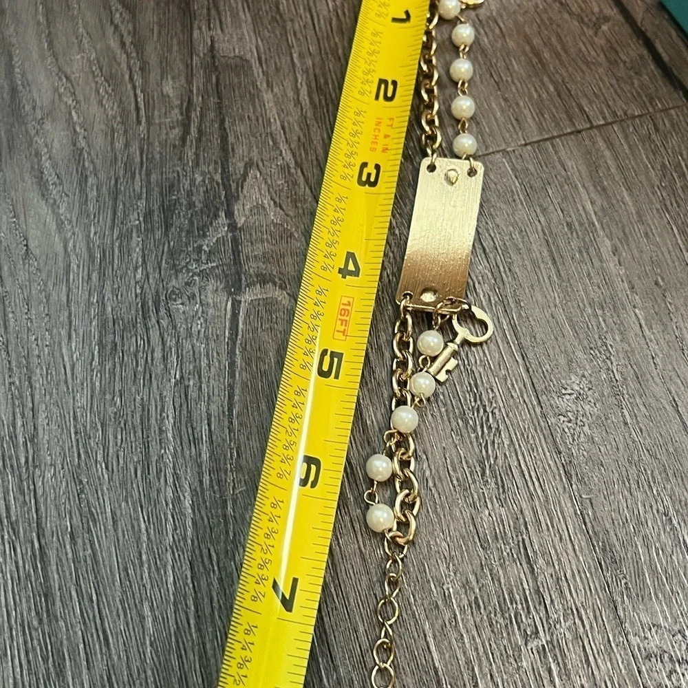 Lock and Key Gold Tone and Pearl Bracelet - Picture 12 of 12